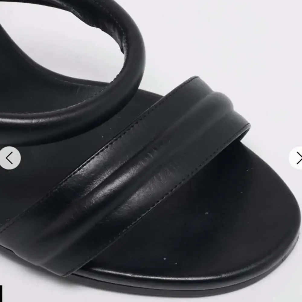 CHANEL black leather